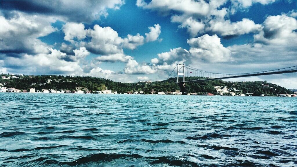 cloud - sky, water, sky, nautical vessel, waterfront, transportation, sea, day, nature, scenics - nature, no people, sailboat, beauty in nature, mode of transportation, outdoors, tranquil scene, tranquility, rippled, travel, yacht, yachting, bay