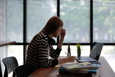 Businesswoman working at office