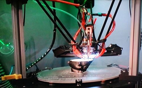 Close-up of illuminated electric lamp hanging on table