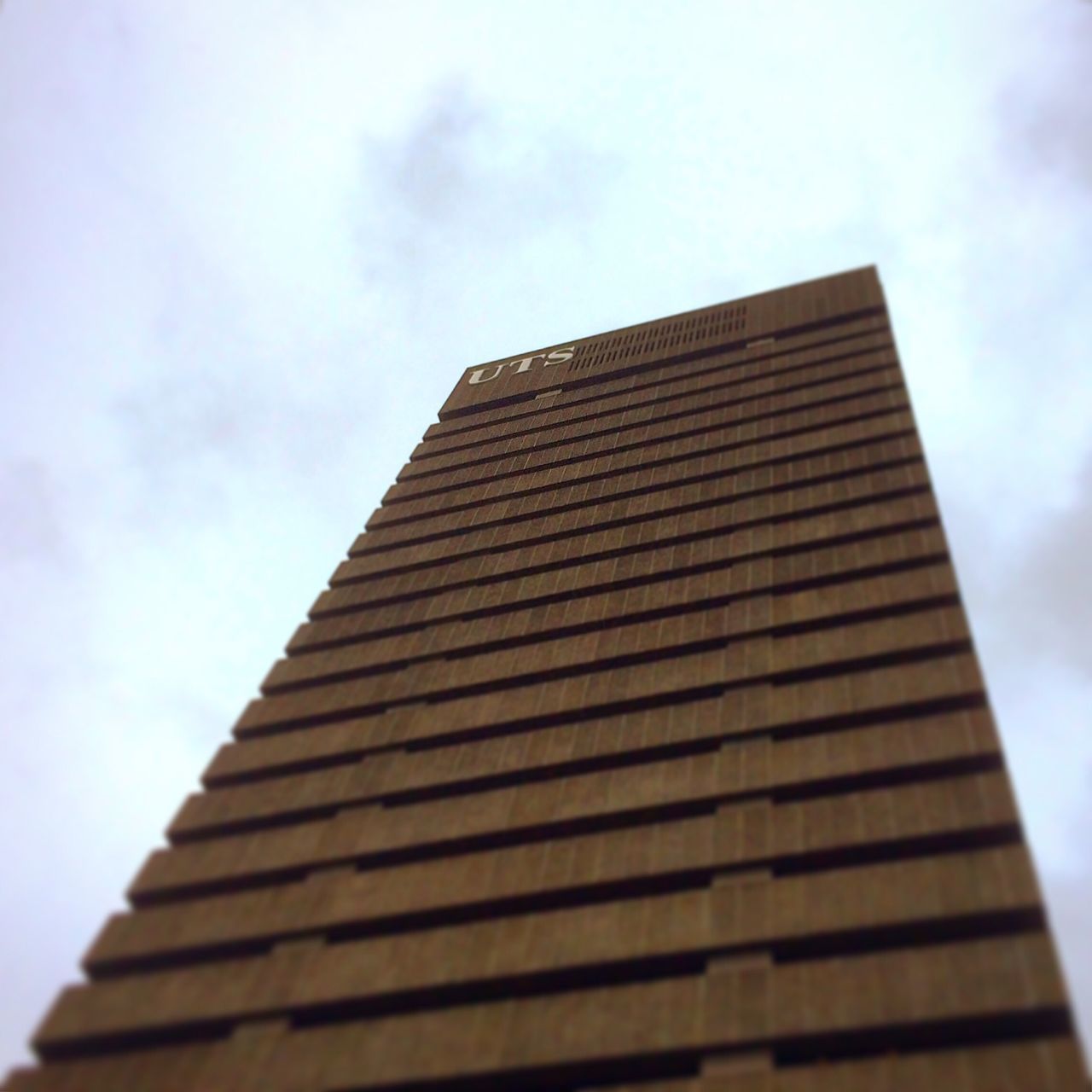 architecture, low angle view, building exterior, built structure, sky, building, cloud - sky, modern, office building, tall - high, city, cloud, window, day, cloudy, skyscraper, outdoors, no people, tower, tall