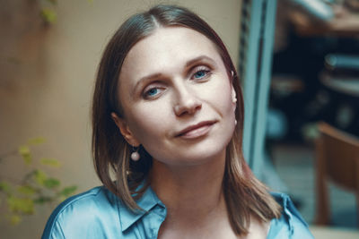 Woman portrait, in a cafe close up