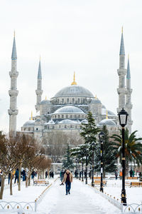 View of cathedral in city during winter