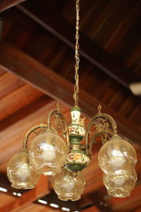 Low angle view of illuminated chandelier