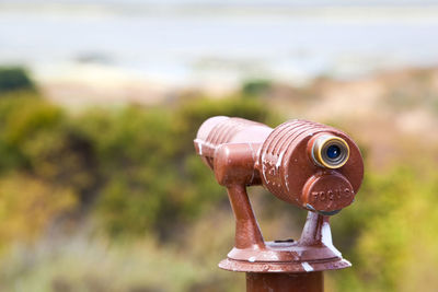 Close-up of coin-operated binoculars