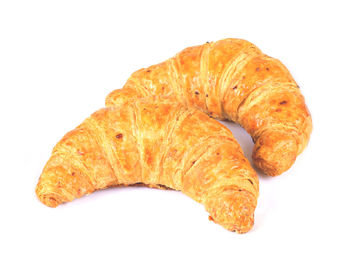 High angle view of orange leaf against white background