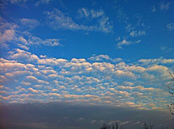 Scenic view of landscape against blue sky