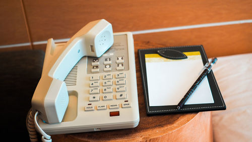 High angle view of smart phone on table
