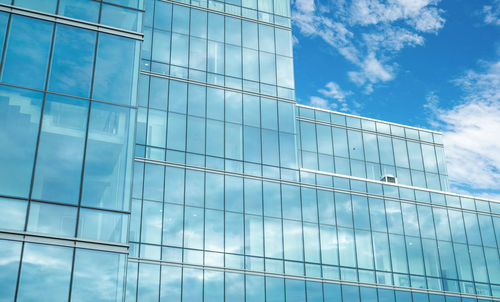 Modern sustainable glass office building. exterior view of corporate headquarters glass building