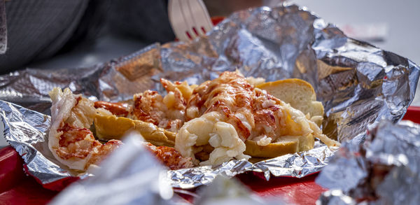 Close-up of lobster roll  on table in maine