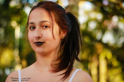 Portrait of woman at park