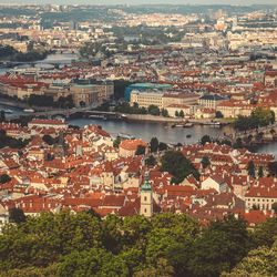 High angle view of river amidst buildings in city