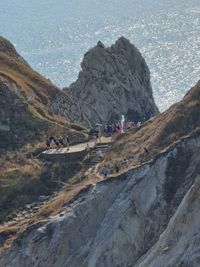 High angle view of sea against mountain