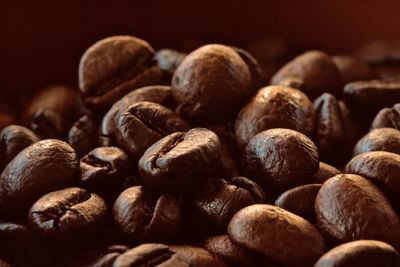 Close-up of coffee beans against white background