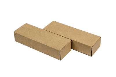 Low angle view of empty paper against white background