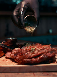 Close-up of meat on barbecue grill