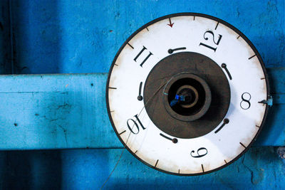 Close-up of old telephone booth on wall