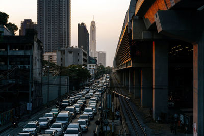 Street amidst buildings in city against sky