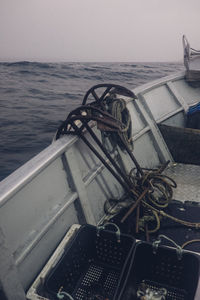 High angle view of abandoned ship in sea against sky