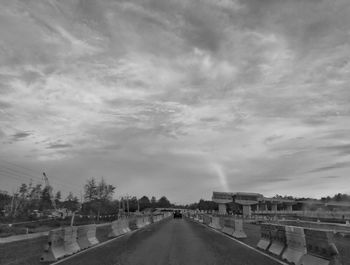 Road in city against sky