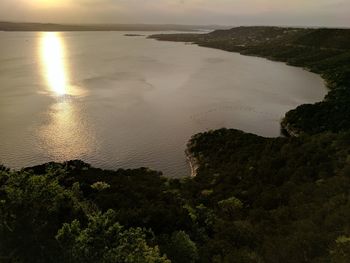 Scenic view of sea against sky at sunset