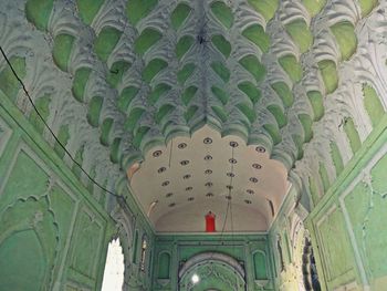 Low angle view of ornate ceiling in old building