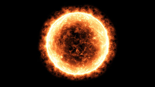 Close-up of fire against black background