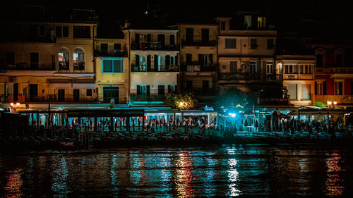 Illuminated sea city at night