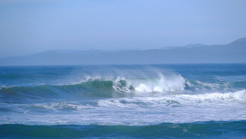 Waves splashing on rocks