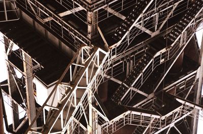 Low angle view of illuminated staircase in building