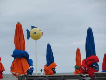 Low angle view of balloons against sky