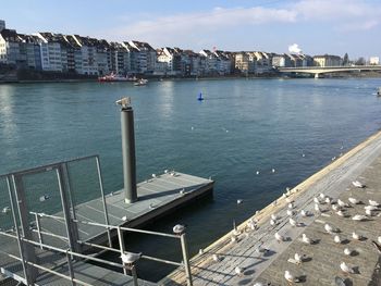 High angle view of harbor by sea against sky