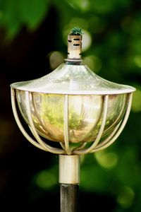 Close-up of electric lamp on table