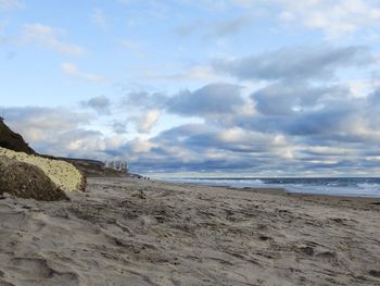 Scenic view of beach against sky