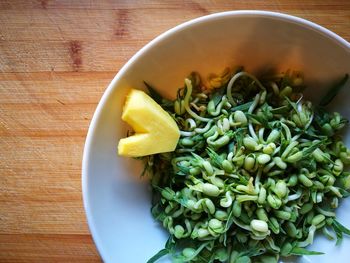 High angle view of chopped vegetables in bowl on table