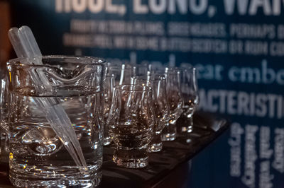 Close-up of glasses on table