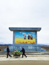 Tourists walking on steps