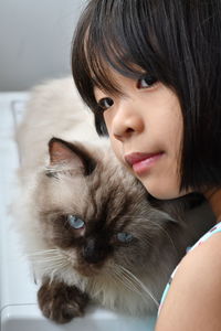 Close-up of beautiful woman at home