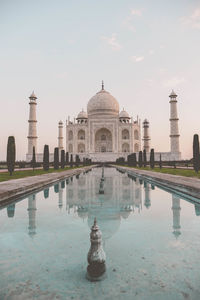 Scenic view of taj mahal against cloudy sky