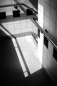 Shadow from window on tiled floor