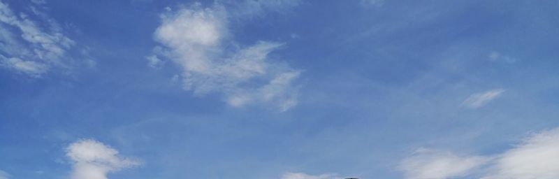 Low angle view of clouds in blue sky