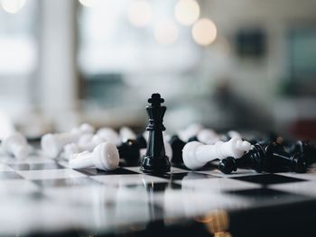 Close-up of chess pieces on board