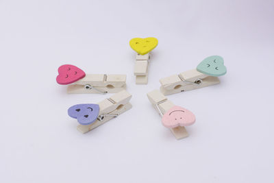 Close-up of toys over white background