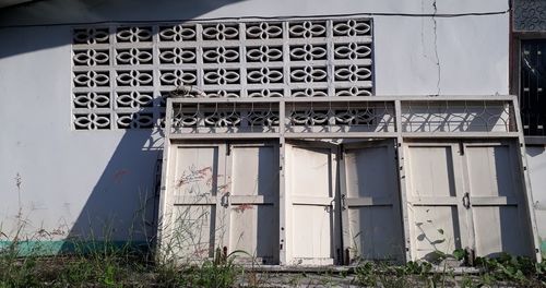 Information sign on wall of abandoned building