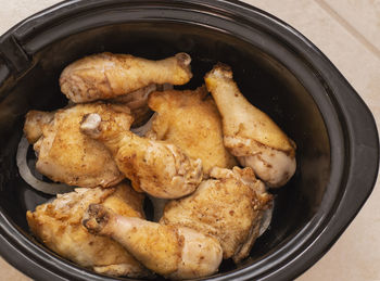 High angle view of meat in container on table