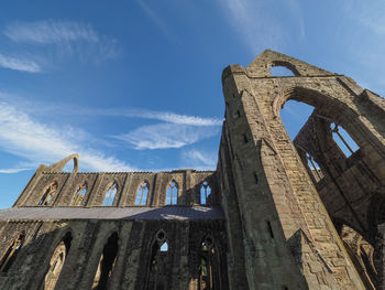 Low angle view of old building against sky