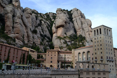 Santa maria de montserrat abbey against rocky mountain