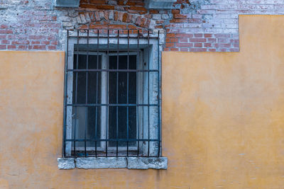 Closed window of old building