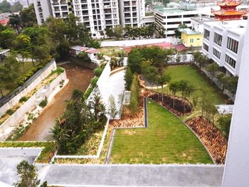 High angle view of street amidst buildings in city