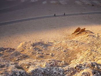 Aerial view of sand dunes against sky