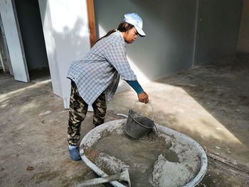 Woman working at construction site